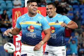 Departing Gold Coast forward David Fifita (left) has been backed by his coach to fire on Sunday. (Jason O'BRIEN/AAP PHOTOS)